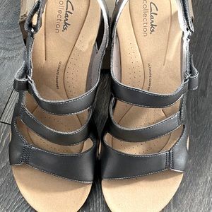 Woman’s new never ware, size 11W, Clark’s brand, color Puter/silver.